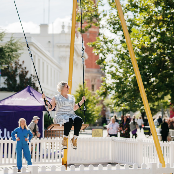 Artisitic Director on the giant SWING