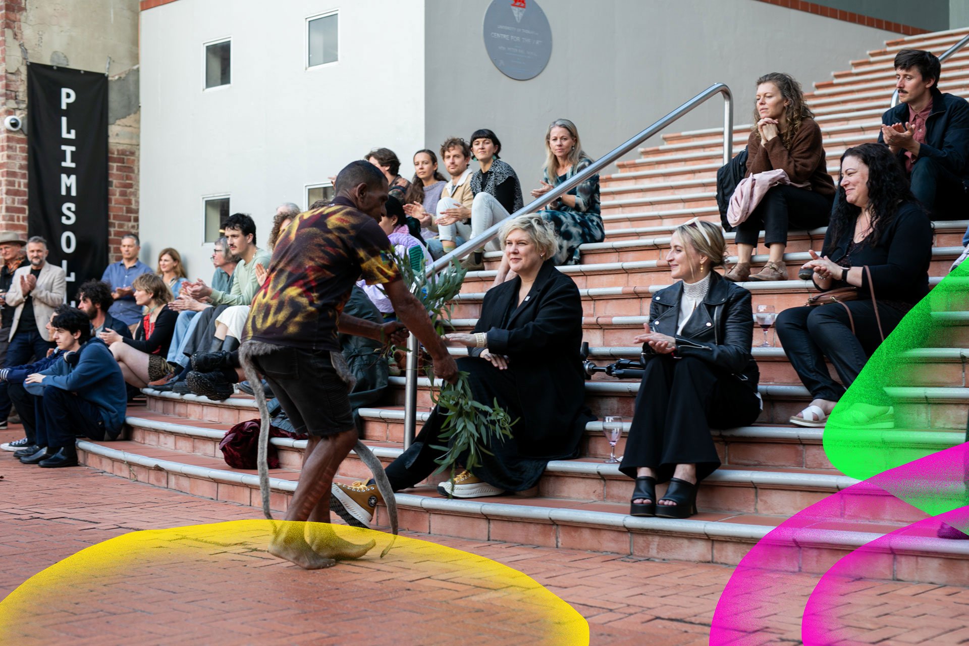 Audience watching performance outside Plimsoll Gallery